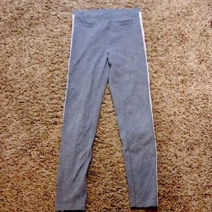 Grey pants with a white a gold stripe down the side size XL 14